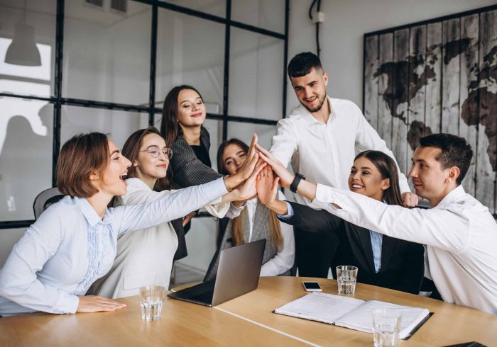 Group of people working out business plan in an office