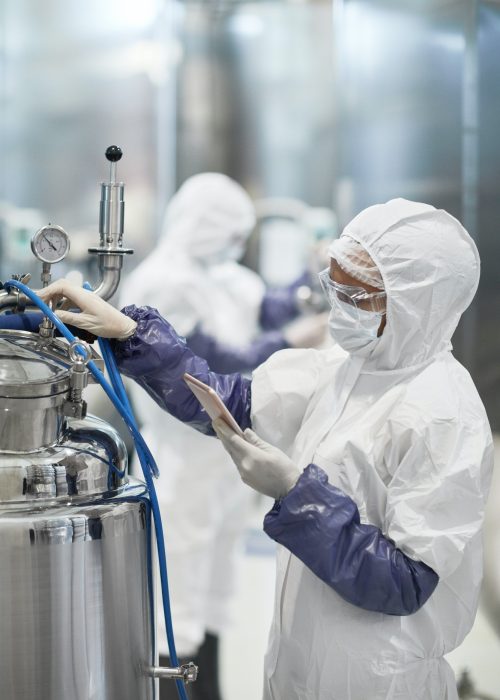 Worker Operating Pharmaceutical Production